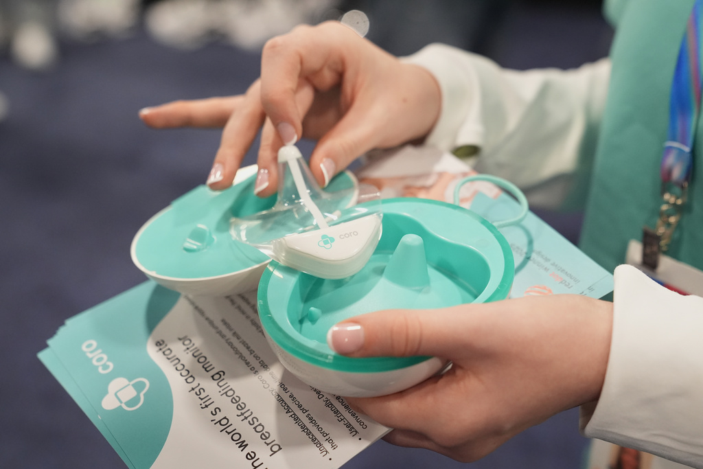 A Coro breastfeeding monitor is pictured at a Coroflo booth during the CES Unveiled tech show Sunday, Jan. 4, 2026, in Las Vegas. (AP Photo/Abbie Parr)