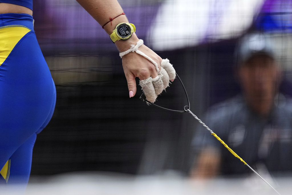 Ukraine's Iryna Klymets prepares for an attempt in the women's hammer throw qualification at the World Athletics Championships in Tokyo, Sunday, Sept. 14, 2025. (AP Photo/Matthias Schrader)