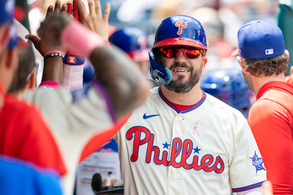 Philadelphia Phillies' Kyle Schwarber is cheered in the dugout after hitting a solo home run in the first inning of a baseball game against the Colorado Rockies, Sunday, May 10, 2026, in Philadelphia. (AP Photo/Laurence Kesterson)