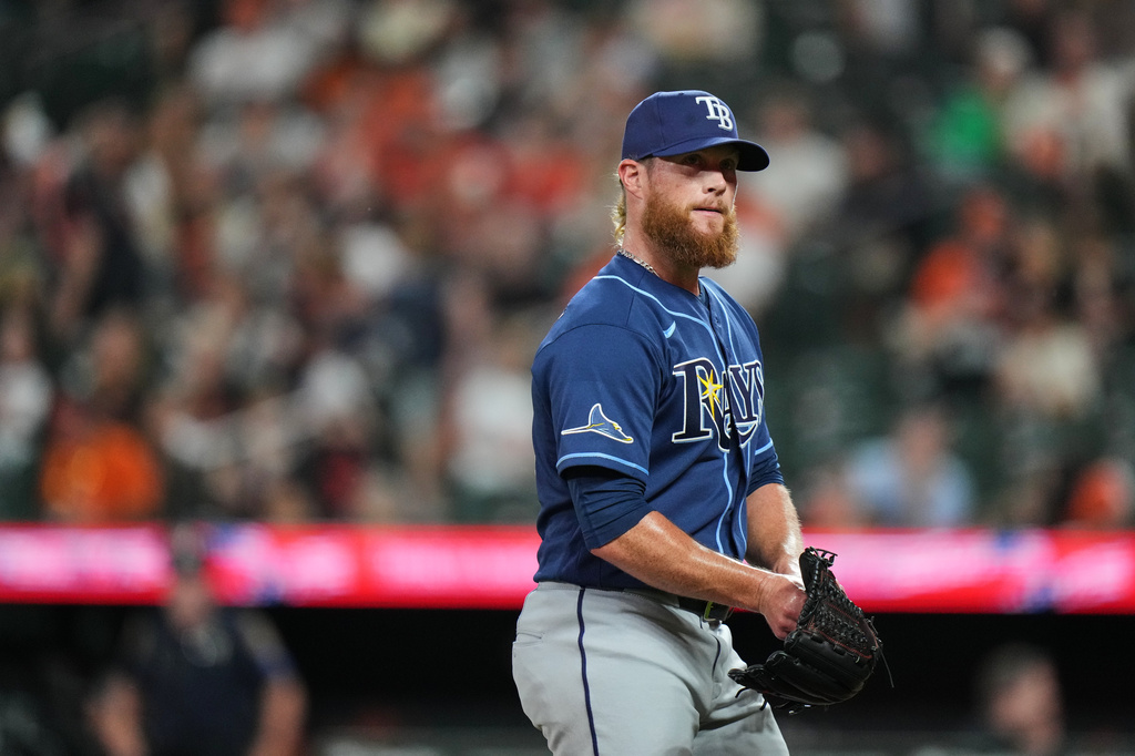 Tampa Bay Rays pitcher Craig Kimbrel returns to the dugout after retiring the side during the ninth inning of a baseball game against the Baltimore Orioles, Tuesday, May 26, 2026, in Baltimore. (AP Photo/Stephanie Scarbrough)