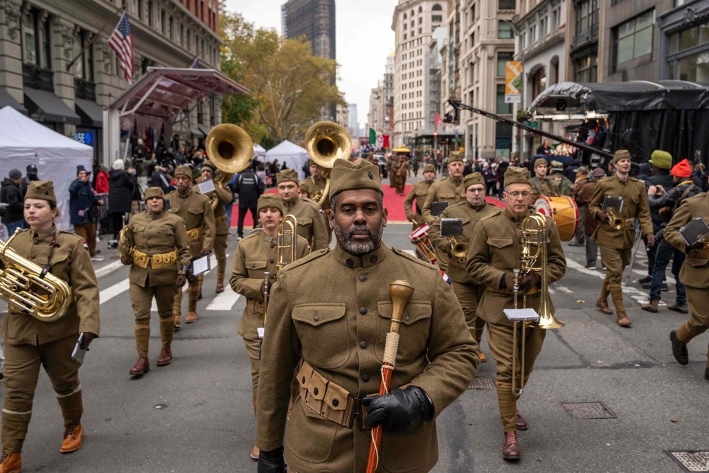 Members of a marching band participate in the Veterans Day parade, Tuesday, Nov. 11, 2025, in New York. (AP Photo/Yuki Iwamura)