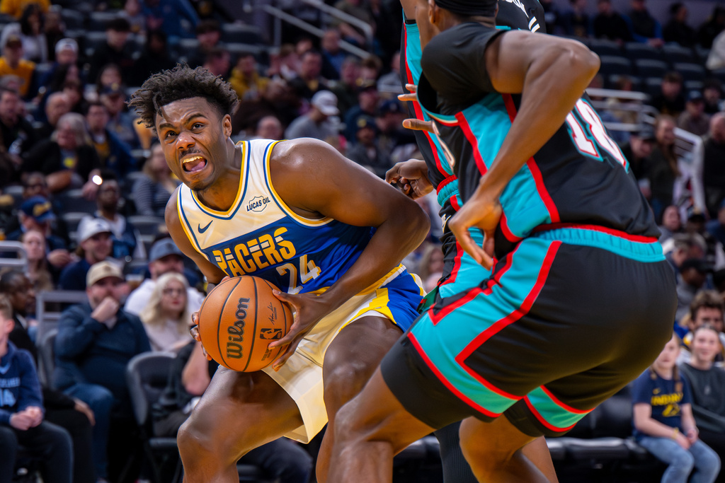 Indiana Pacers guard Kobe Brown (24) prepares to shoot during the second half of an NBA basketball game against the Memphis Grizzlies in Indianapolis, Sunday, March 1, 2026. (AP Photo/Doug McSchooler)