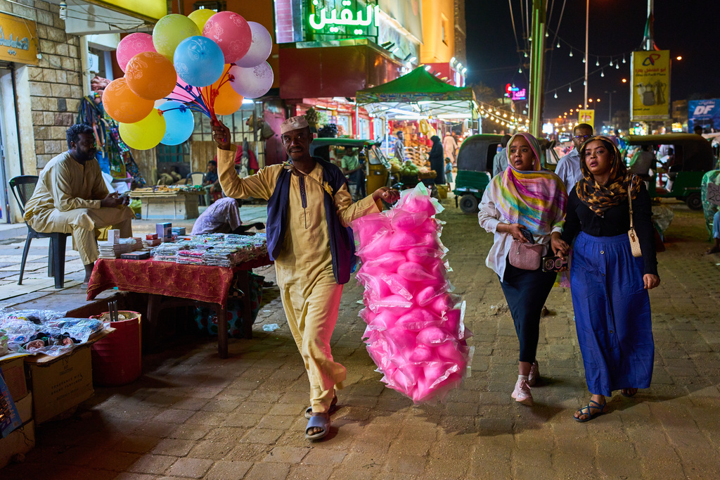 A street vendor sells candy and balloons in Omdurman, Sudan, on the outskirts of Khartoum, Tuesday, April 21, 2026. (AP Photo/Bernat Armangue)