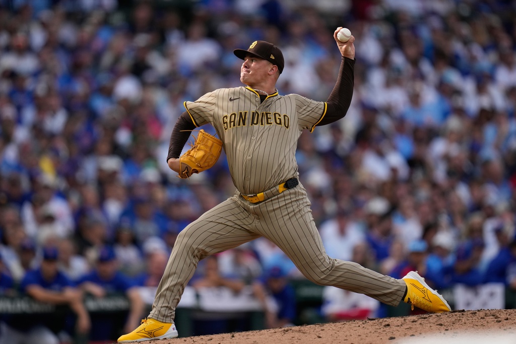 San Diego Padres' Adrian Morejon throws during the sixth inning of Game 2 of a National League wild card baseball game against the Chicago Cubs Wednesday, Oct. 1, 2025, in Chicago. (AP Photo/Erin Hooley)