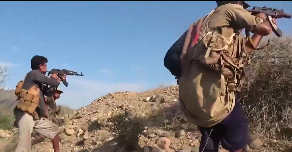 This image taken from undated video released by the Ansar Allah Media Office, the media arm of Yemen's Houthi rebels, on Tuesday, Sept. 22, 2026, shows, according to the group, Houthi fighters firing rifles during clashes with Saudi-backed forces at an undisclosed location in Yemen. (Ansar Allah Media Office via AP)