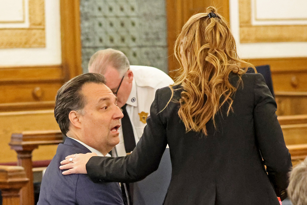 Defendant Brian Walshe, left, chats with his lawyer Kelli Porges during his murder trial, Friday, Dec. 12, 2025, in Dedham, Mass. (Stuart Cahill/The Boston Herald via AP, Pool)