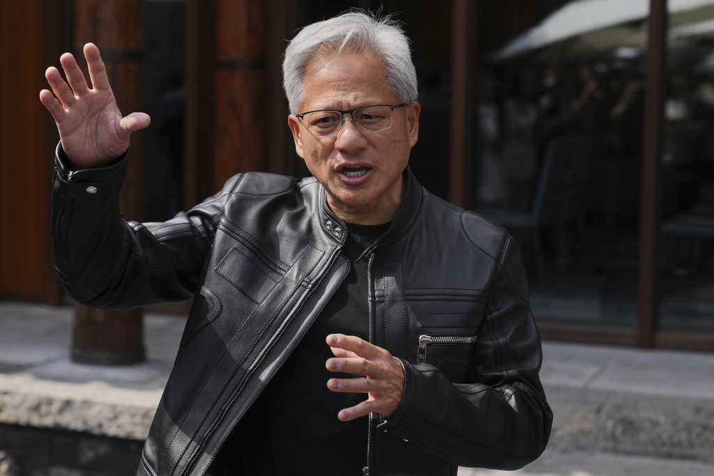 FILE - CEO of Nvidia Jensen Huang speaks during a press conference at the Mandarin Oriental Qianmen after attending the third China International Supply Chain Expo, in Beijing, July 16, 2025. (AP Photo/Andy Wong, File)