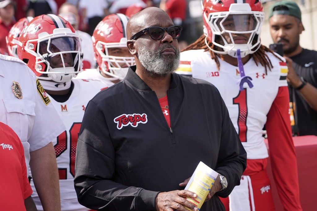 Maryland head coach Michael Locksley takes the field before an NCAA college football game against Wisconsin Saturday, Sept. 20, 2025, in Madison, Wis. (AP Photo/Morry Gash)