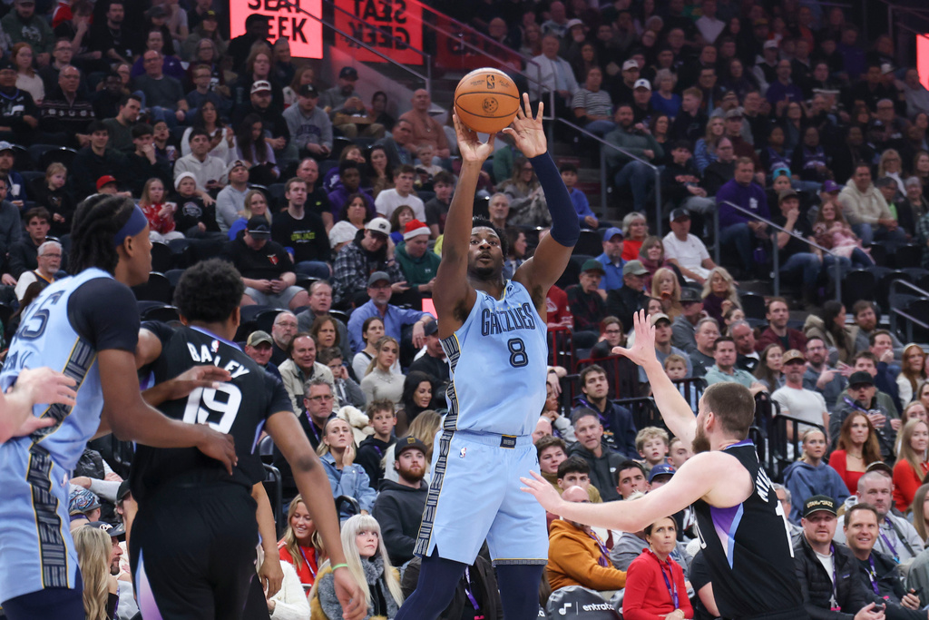 Memphis Grizzlies forward Jaren Jackson Jr. (8) goes for a shot against the Utah Jazz during the first half of an NBA basketball game, Tuesday, Dec. 23, 2025, in Salt Lake City. (AP Photo/Rob Gray)
