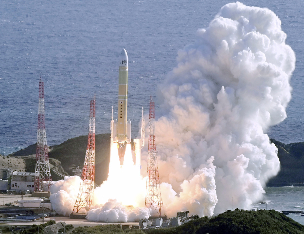 The H3 rocket (8th) by the Japan Aerospace Exploration Agency (JAXA), carrying a navigation satellite, is launched from the Tanegashima Space Center in Minamitane, Tanegashima island, southern Japan Monday, Dec.22, 2025. (Kyodo News via AP)