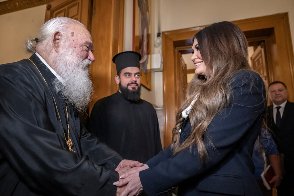 Kimberly Guilfoyle, U.S. Ambassador to Greece, right, meets the Archbishop of Athens and leader of Greece's Orthodox Church, Ieronymos II in Athens, Thursday, Nov 13, 2025. (Aris Messinis/ Pool Photo via AP)