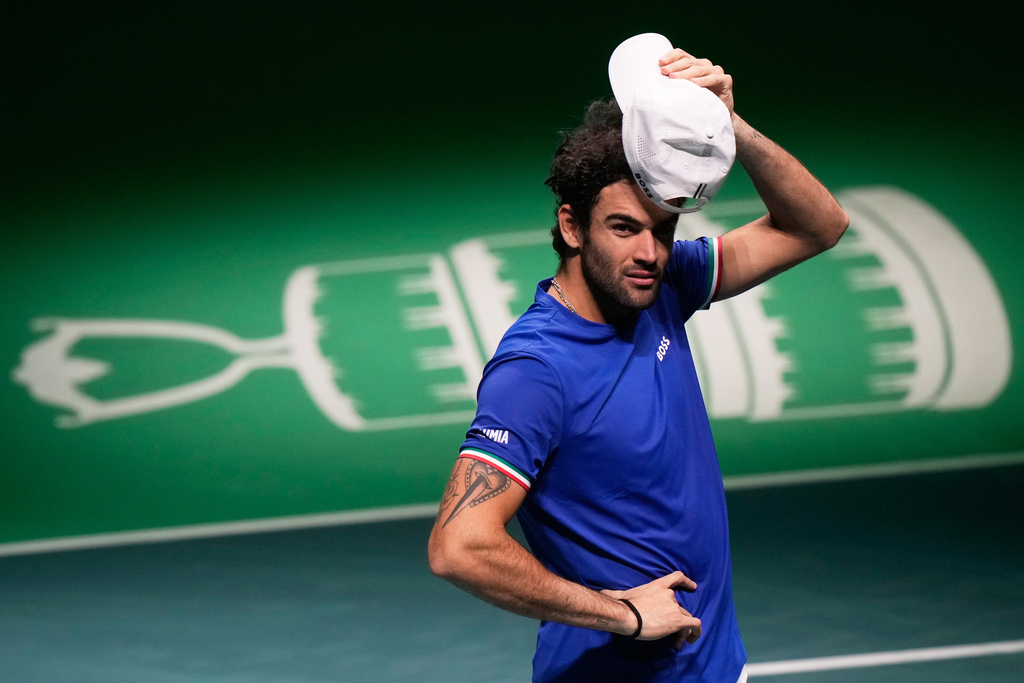 Italy's Matteo Berrettini celebrates after winning a Davis Cup semifinal singles tennis match between Italy and Belgium against Belgium's Raphael Collignon in Bologna, Italy, Friday, Nov. 21, 2025. (AP Photo/Luca Bruno)
