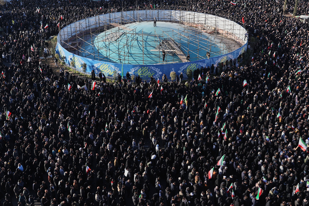 Government supporters gather in mourning after state TV officially announced the death of Iranian Supreme Leader Ayatollah Ali Khamenei, in Tehran, Iran, Sunday, March 1, 2026. (AP Photo/Vahid Salemi)