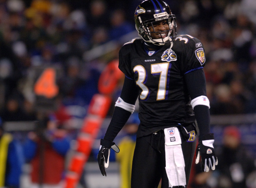 FILE - Baltimore Ravens cornerback Deion Sanders smiles during the third quarter of a football game against the Green Bay Packers, Dec. 19, 2005, in Baltimore. (AP Photo/Gail Burton, File)