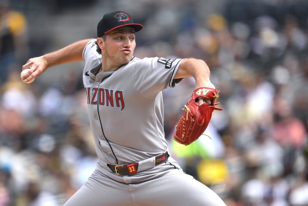 Arizona Diamondbacks starting pitcher Brandon Pfaadt works against a San Diego Padres batter during the first inning of a baseball game Sunday, Sept. 28, 2025, in San Diego. (AP Photo/Orlando Ramirez)