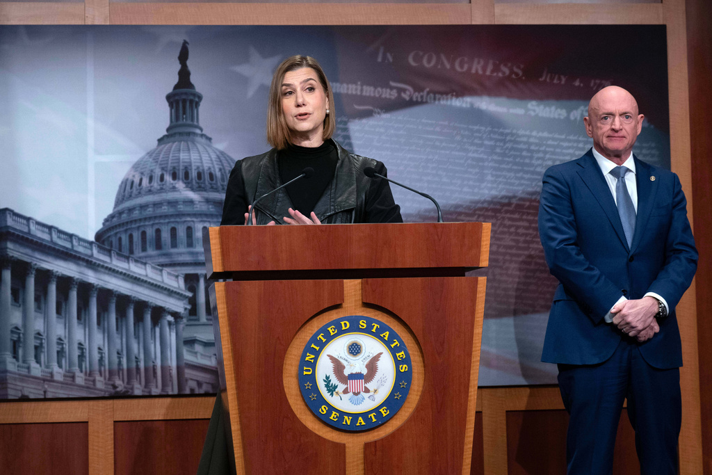 Rep. Elissa Slotkin, D-Mich., and Sen. Mark Kelly, D-Ariz., speak during a news conference at Capitol Hill, Wednesday, Feb. 11, 2026, in Washington. (AP Photo/Jose Luis Magana)