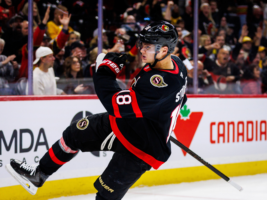 Ottawa Senators' Tim Stutzle (18) celebrates his goal against the Nashville Predators during second period of an NHL hockey game in Ottawa, Ontario, Saturday, Oct. 10, 2026. (Keito Newman/The Canadian Press via AP)