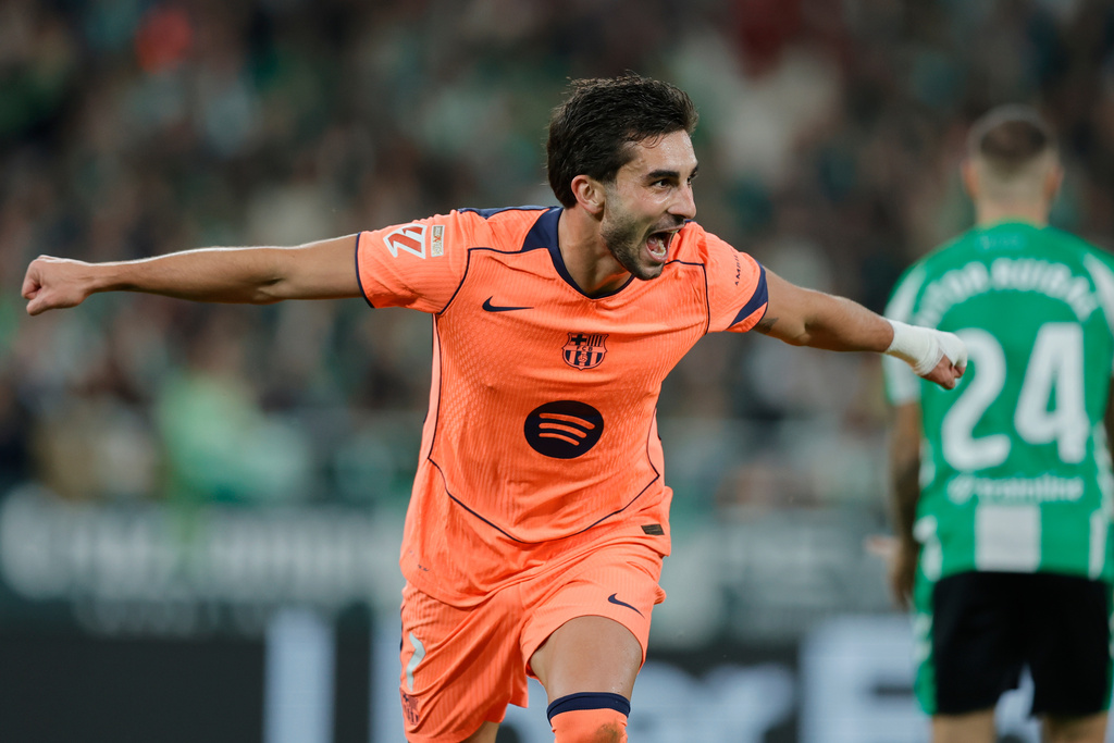 Barcelona's Ferran Torres celebrates after scoring his side second goal during the Spanish La Liga soccer match between Real Betis and Barcelona in Seville, Spain, Saturday, Dec. 6, 2025. (AP Phot/Manu Reino)