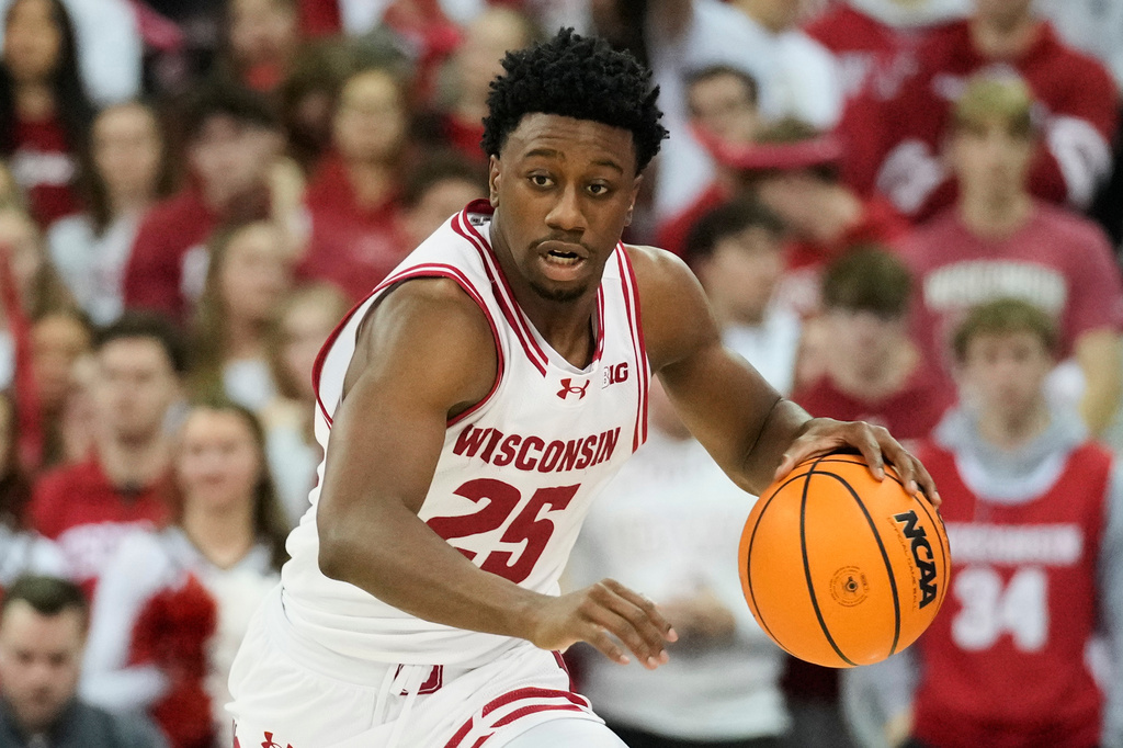 FILE - Wisconsin guard John Blackwell dribbles against Ohio State during the second half of an NCAA college basketball game Jan. 31, 2026, in Madison, Wis. (AP Photo/Kayla Wolf, File)