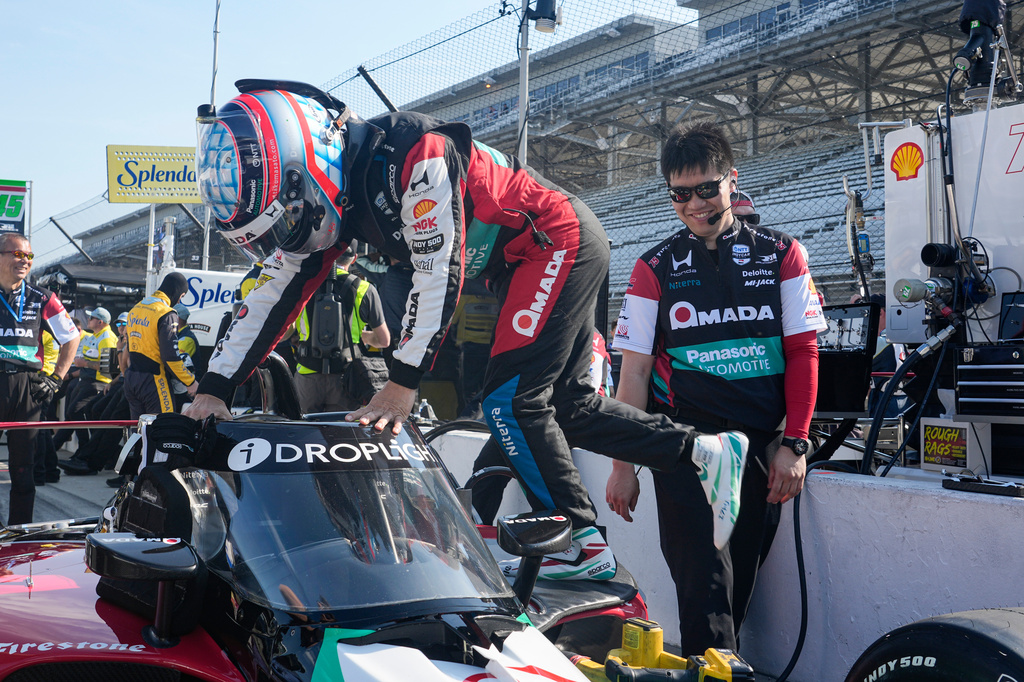Takuma Sato, of Japan, climbs into his car during practice for the Indianapolis 500 auto race at the Indianapolis Motor Speedway in Indianapolis, Sunday, May 17, 2026. (AP Photo/Michael Conroy)