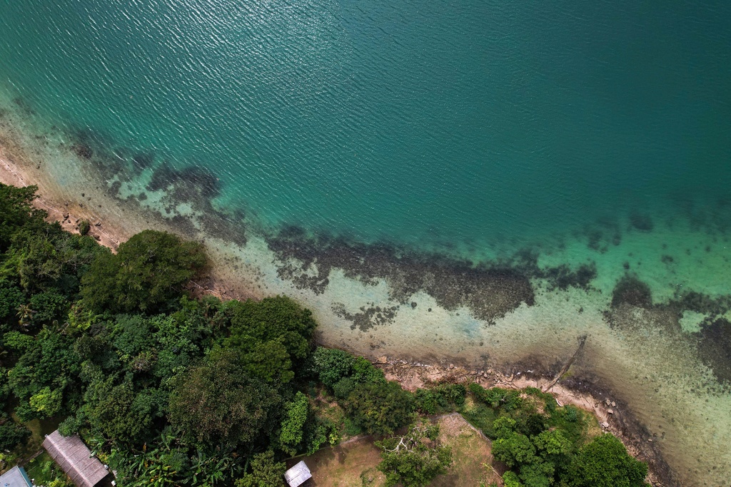 FILE - The coastline of Efate Island, Vanuatu is visible on July 19, 2025. (AP Photo/Annika Hammerschlag, File)