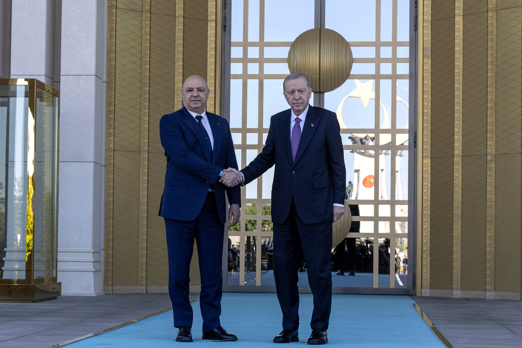 Turkish President Recep Tayyip Erdogan, right, shakes hands with his Lebanese counterpart Joseph Aoun before their meeting at the presidential palace in Ankara, Thursday, July 30, 2026. (Ugur Yildirim/DIA Photo via AP)