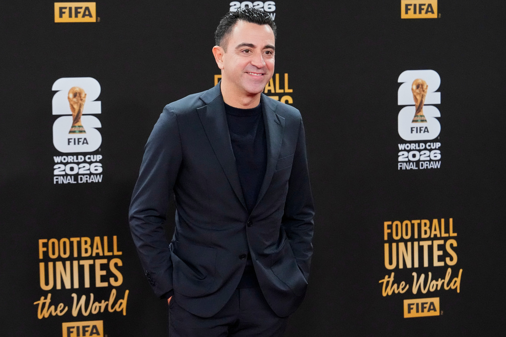 FILE - Xavi Hern&aacute;ndez poses for a photo as he arrives on the red carpet for a welcome reception ahead of the draw for 2026 soccer World Cup at the Kennedy Center in Washington, Dec. 4, 2025. (AP Photo/Chris Carlson, File)