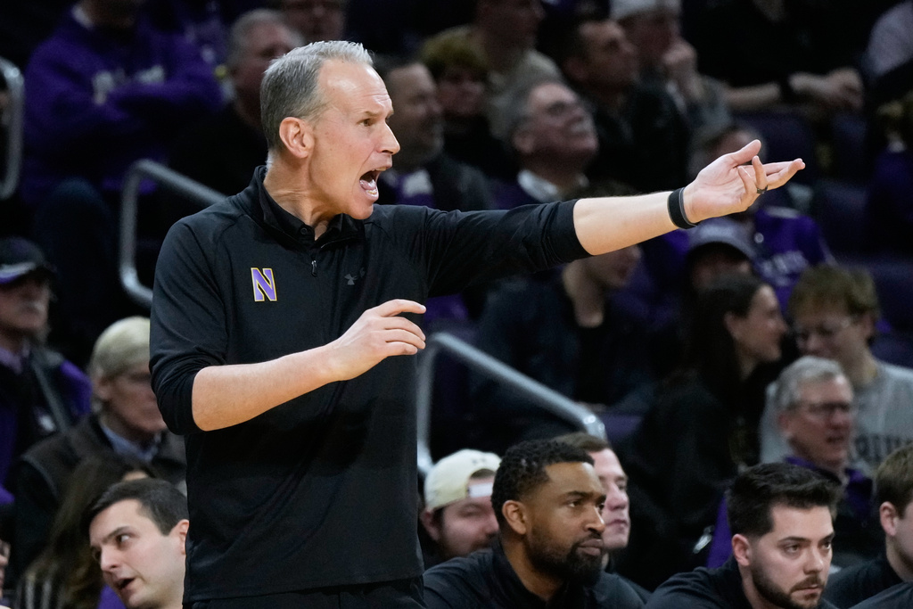 Northwestern head coach Chris Collins yells as he gives instructions to his team during the first half of an NCAA college basketball game against Purdue in Evanston, Ill., Wednesday, March 4, 2026. (AP Photo/Nam Y. Huh)