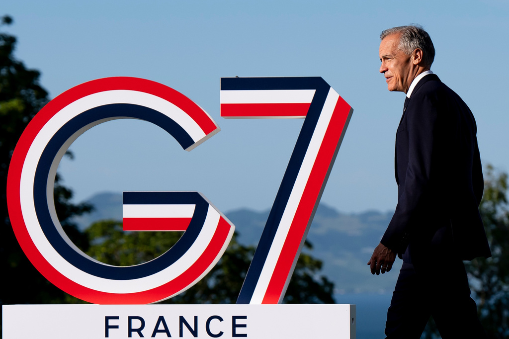 Canadian Prime Minister Mark Carney arrives during the G7 summit in Evian-les-Bains, France, Monday, June 15, 2026. (Christopher Katsarov/The Canadian Press via AP)
