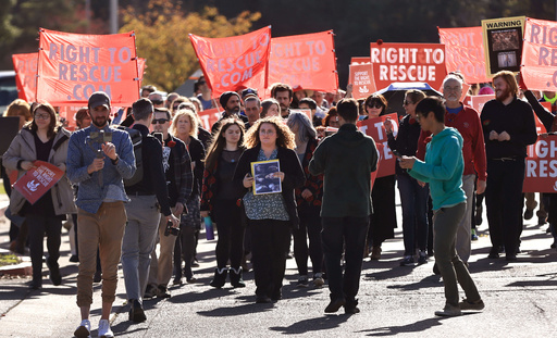 Animal welfare activist Zoe Rosenberg leads a protest march to the Sonoma County Sheriff's Office in Santa Rosa, Nov. 30, 2023. (Chad Surmick/The Press Democrat via AP) Animal welfare activist Zoe Rosenberg leads a protest march to the Sonoma County Sheriff's Office in Santa Rosa, Nov. 30, 2023. (Chad Surmick/The Press Democrat via AP)