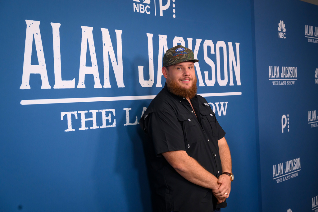 Luke Combs arrives on the red carpet for Alan Jackson's final farewell concert called, "Last Call: One More for the Road - The Finale," at Nissan Stadium, Saturday, June 27, 2026, in Nashville, Tenn. (AP Photo/John Amis)
