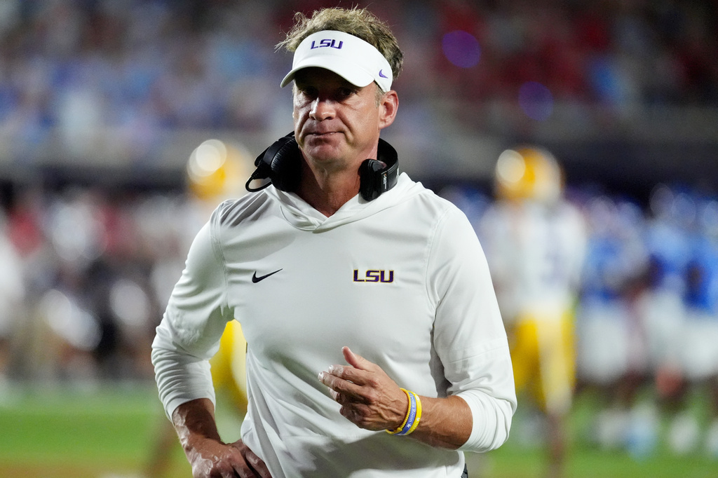 LSU head coach Lane Kiffin gestures towards an official during the first half of an NCAA college football game against Mississippi in Oxford, Miss., Saturday, Sept. 19, 2026. (AP Photo/Rogelio V. Solis)