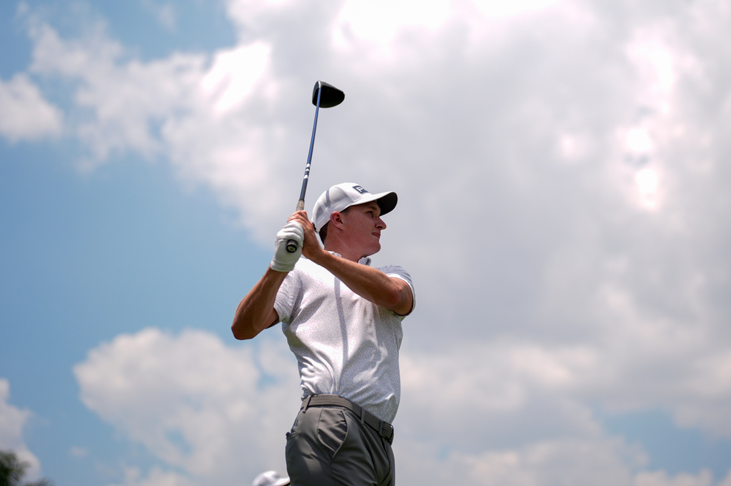Matt McCarty hits from the second tee during the third round of the Cadillac Championship PGA golf tournament Saturday, May 2, 2026, in Doral, Fla. (AP Photo/David J. Phillip)
