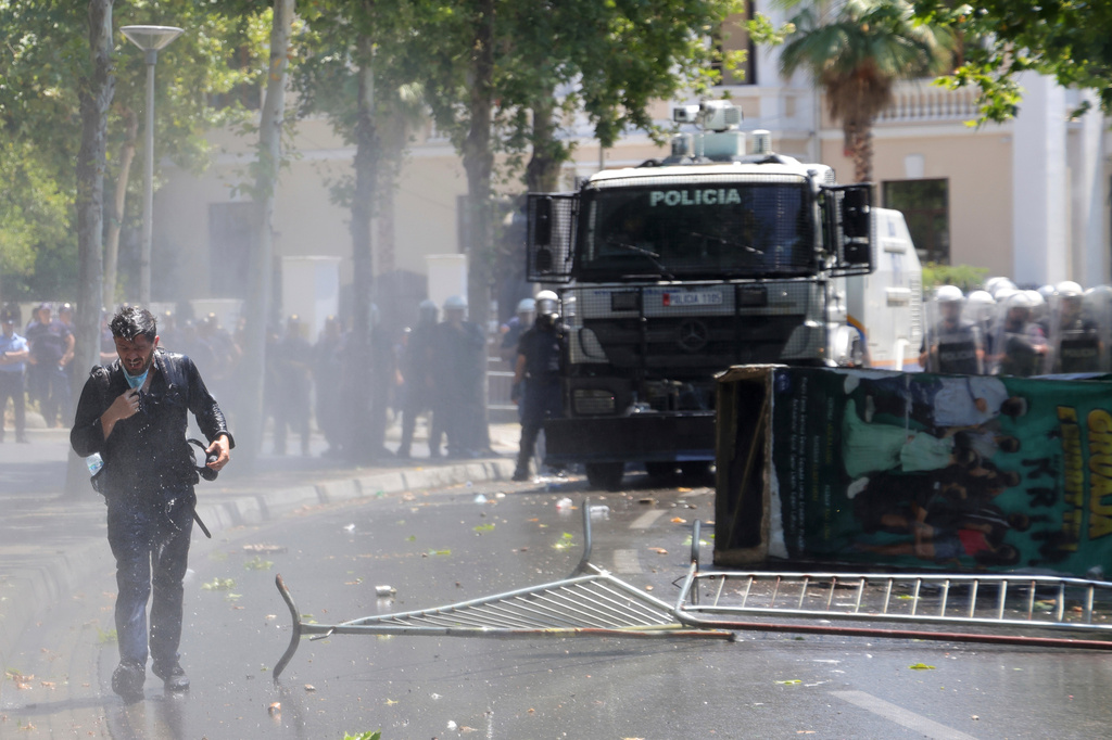 Police use a water cannon during clashes at an anti-government rally in Tirana, Albania, Thursday, July 2, 2026. (AP Photo/Hameraldi Agolli)