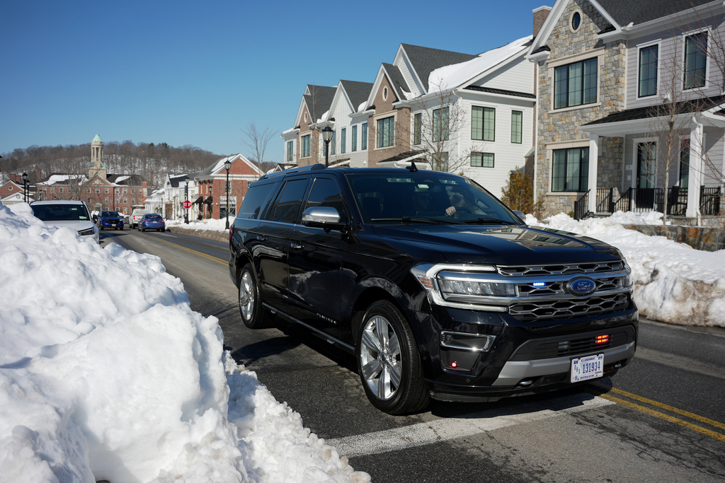 A motorcade carrying former President Bill Clinton approaches the Chappaqua Performing Arts Center where Clinton is scheduled to testify before U.S. House lawmakers as part of a congressional investigation into convicted sex offender Jeffrey Epstein, Friday, Feb. 27, 2026, in Chappaqua, N.Y. (AP Photo/Angelina Katsanis)
