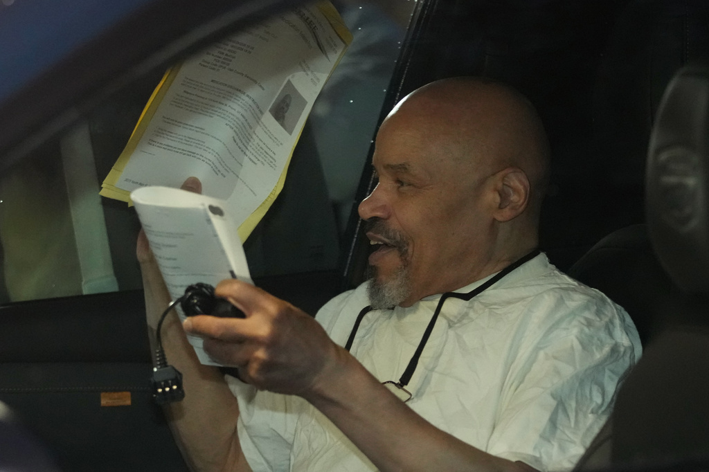 Douglas Stewart Carter sits in a car after he was released out of the Utah County Jail as a Utah judged ordered his release from jail on Monday Sept. 28, 2026, in Spanish Fork, Utah. (AP Photo/George Frey)