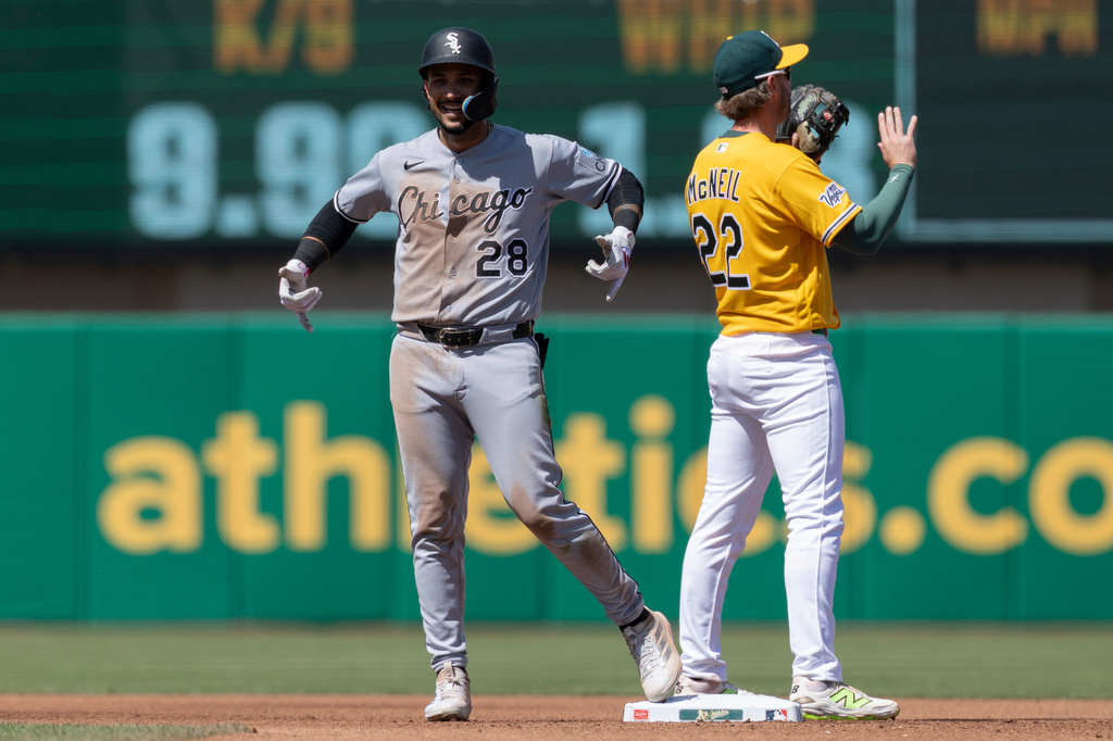Chicago White Sox' Everson Pereira (28) celebrates after hitting a double during the sixth inning of a baseball game against the Athletics, Saturday, April 18, 2026, in West Sacramento, Calif. (AP Photo/Sara Nevis)
