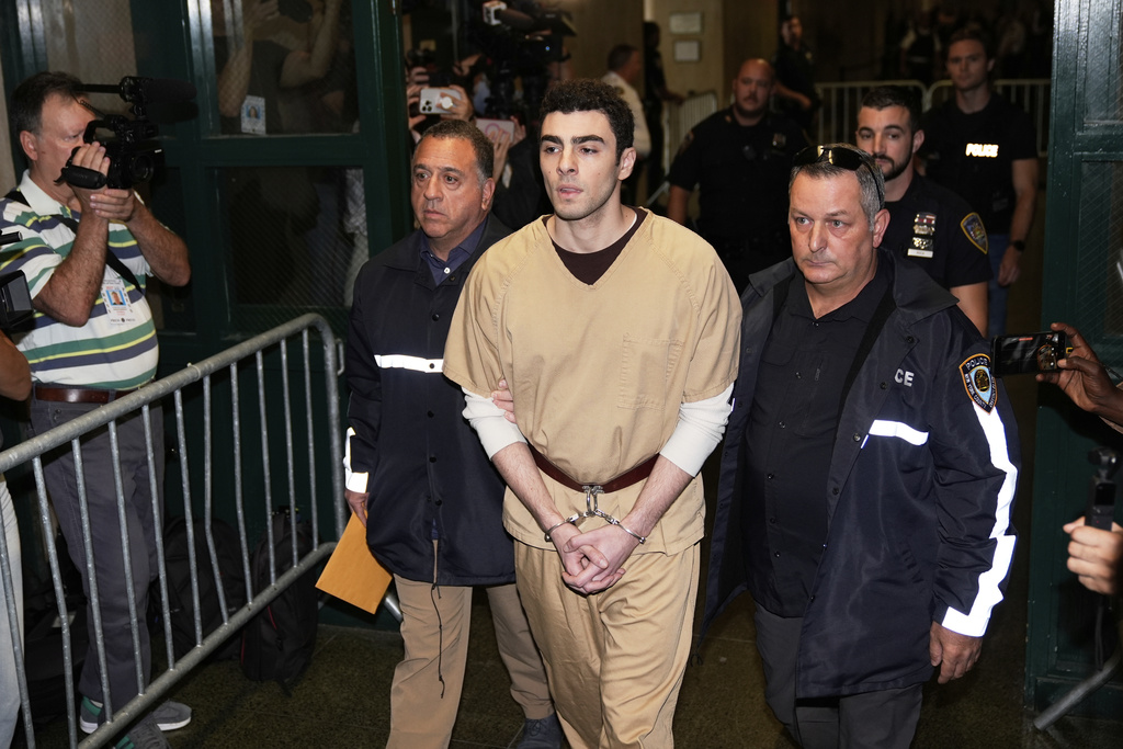 Luigi Mangione is escorted into Manhattan state court in New York, Tuesday, Sept. 16, 2025. (AP Photo/Seth Wenig)