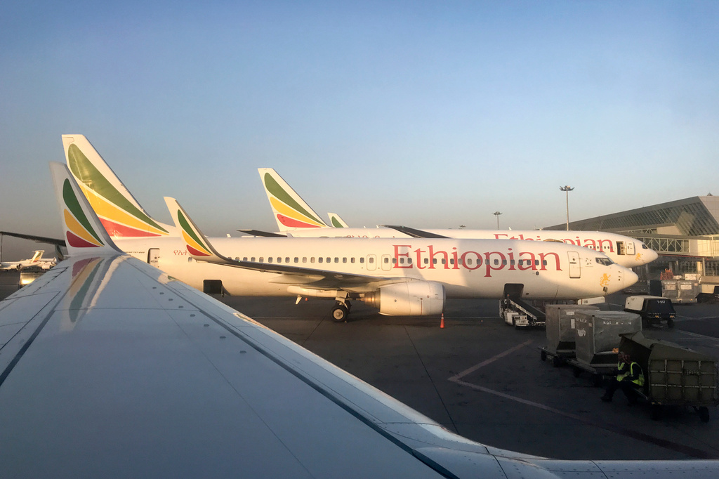 FILE - Ethiopian Airlines planes are parked at Bole International Airport in Addis Ababa, Ethiopia, Monday, Feb. 11, 2019. (AP Photo/Ben Curtis, File)