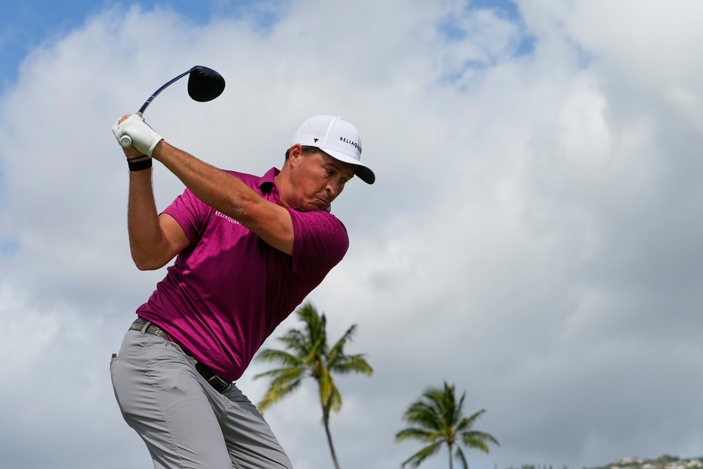 Kevin Roy hits on the 14th hole during the first round of the Sony Open golf event at the Waialae Country Club in Honolulu, Thursday, Jan. 15, 2026. (AP Photo/Matt York)