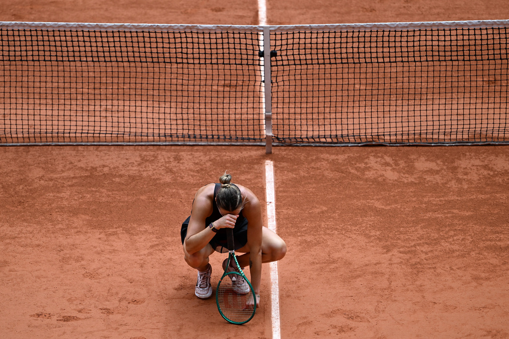 Aryna Sabalenka of Belarus reacts after losing the quarterfinal tennis match against Russia's Diana Shnaider at the French Open in Paris, Wednesday, June 3, 2026. (AP Photo/Emma Da Silva)
