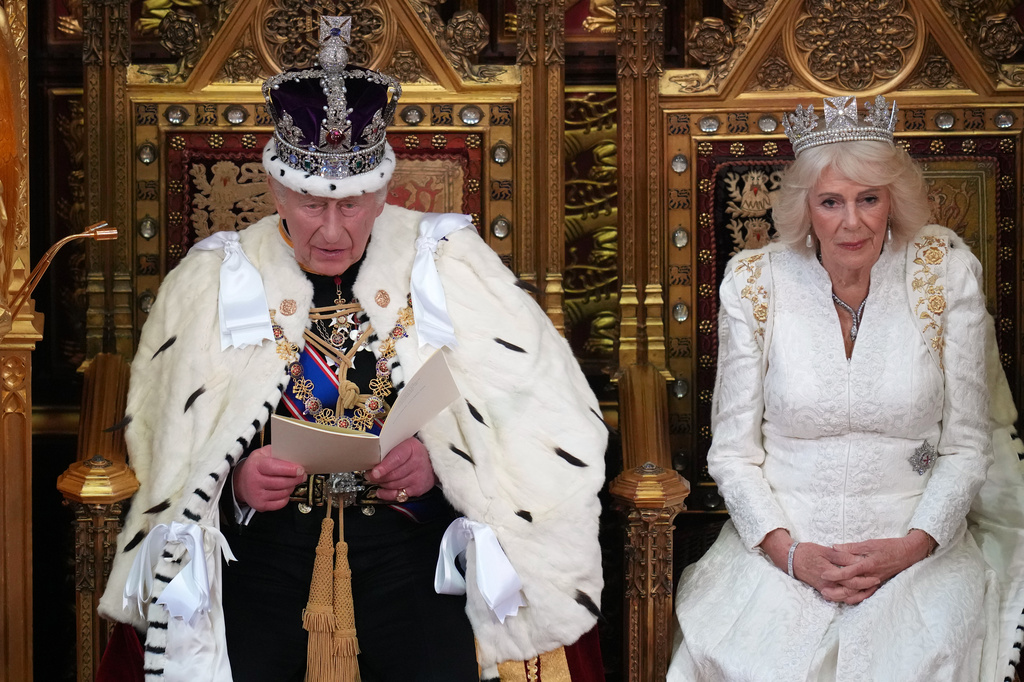 Britain's King Charles III speaks as he sits besides Queen Camilla during the State Opening of Parliament at the Palace of Westminster in London, Wednesday, May 13, 2026.(AP Photo/Kirsty Wigglesworth, Pool)