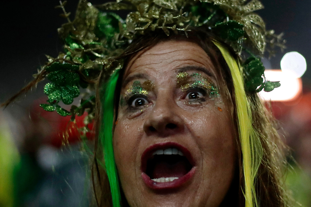 FILE - A soccer fan reacts to Brazil's third goal in a World Cup match against Scotland, during a fan fest on Copacabana Beach in Rio de Janeiro, June 24, 2026. (AP Photo/Bruna Prado, File)
