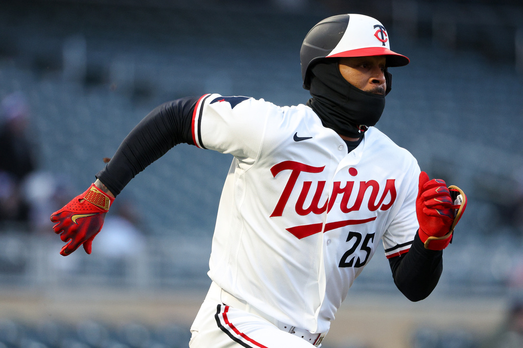 Minnesota Twins designated hitter Byron Buxton runs the bases after hitting a double against the Detroit Tigers during the third inning of baseball game Monday, April 6, 2026, in Minneapolis. (AP Photo/Matt Krohn)