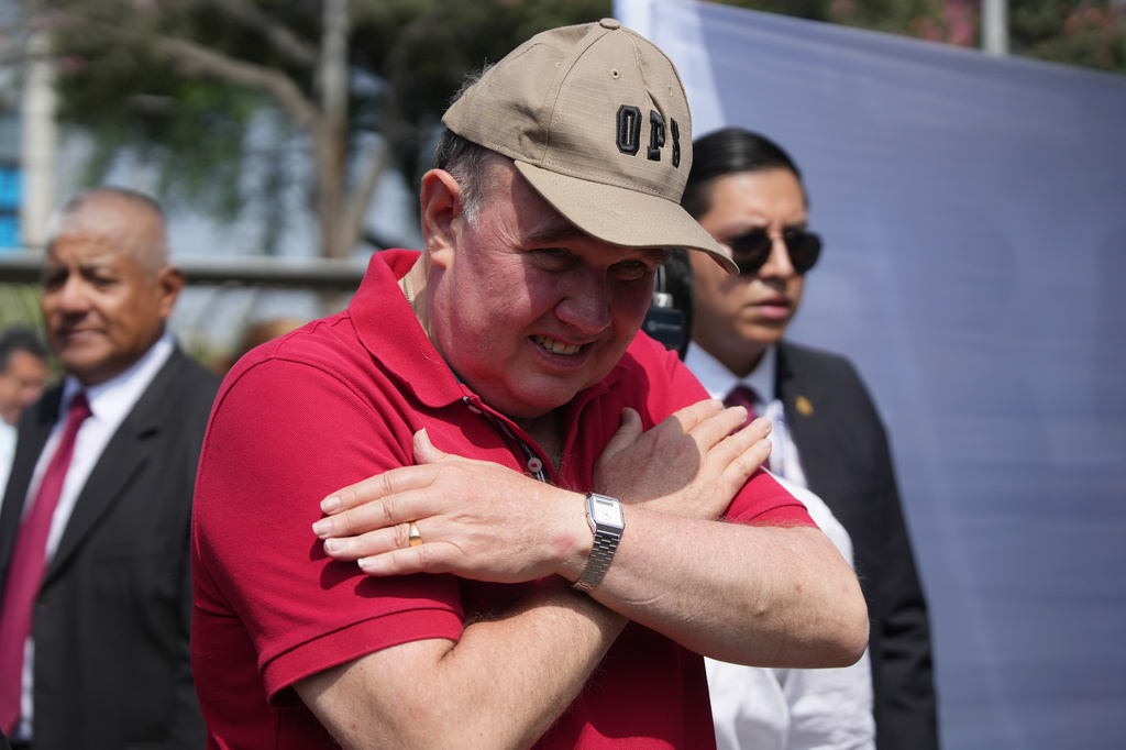 Rafael Lopez Aliaga, presidential candidate of the Popular Renewal, arrives to vote during general elections in Lima, Peru, Sunday, April 12, 2026. (AP Photo/Guadalupe Pardo)