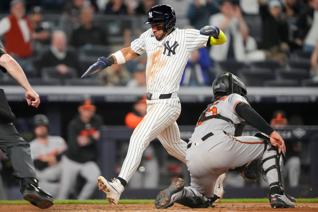 New York Yankees' Jose Caballero (72) runs to home base to score during the eighth inning of a baseball game against the Baltimore Orioles, Monday, May 4, 2026, in New York. (AP Photo/Yuki Iwamura)