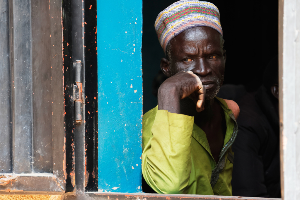 A worried parent of abducted school children looks on at St. Mary's Catholic Primary and Secondary School in Papiri community, Nigeria, Friday, Nov. 28, 2025. (AP Photo )