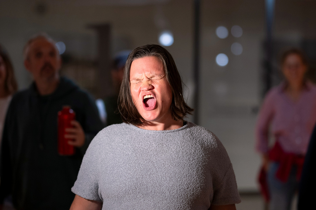 A woman yodels during a public event in an underground garage in Graz, Austria, on Wednesday, Sept. 23, 2026. (AP Photo/Denes Erdos)