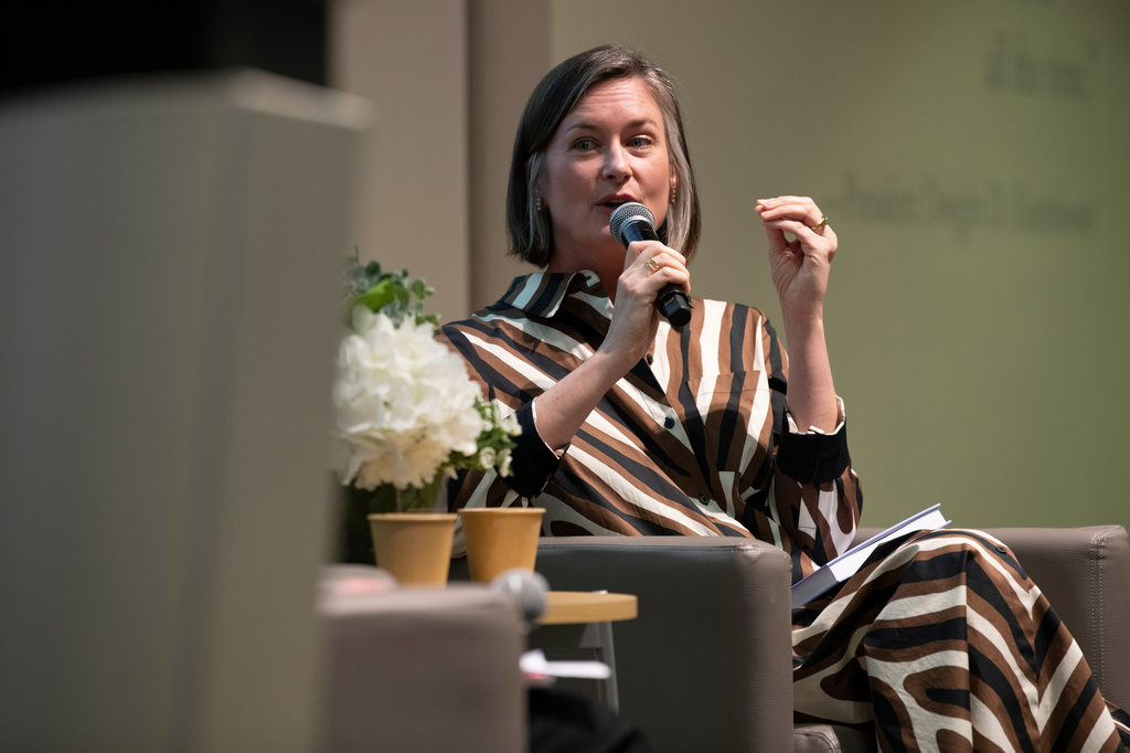 Katharine Wilkinson gives a talk about living with climate uncertainty at American University in Washington on April 14, 2026. (AP Photo/Michael Phillis)