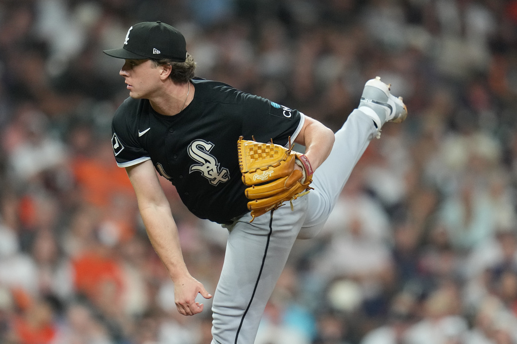 Chicago White Sox relief pitcher Grant Taylor follows through on a pitch during the seventh inning in Game 1 of baseball's American League Wild Card Series against the Houston Astros, Tuesday, Sept. 29, 2026, in Houston. (AP Photo/Karen Warren
